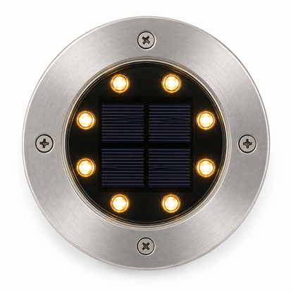 Gros plan spot solaire jardin inox 8 LED blanc chaud allumé vue dessus
