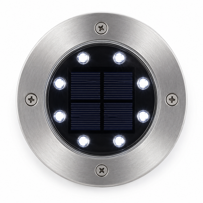 Gros plan spot solaire jardin inox 8 LED blanc froid allumé vue dessus